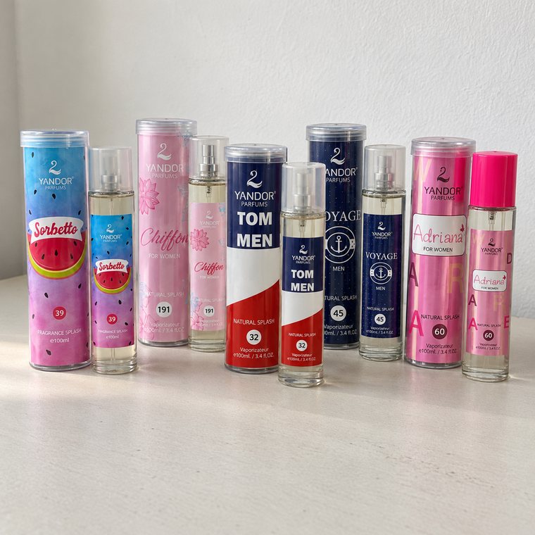 Perfumes Yandor en estuche cilíndrico transparente